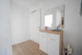 Eingangsbereich - DIETZ: Moderne und helle 4-Wohnung im 3. OG , 1 Terrasse, Aufzug und 2 TG-Stellplätzen in Rödermark!