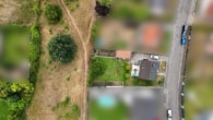 Luftansicht - DIETZ: Einfamilienhaus mit Garage, großem Garten in einer ruhigen Randlage! Wohnhausanbau möglich!