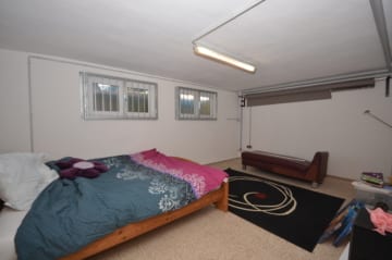 DIETZ: Bungalowimmobilie mit viel Wiesenfläche in einer herrlichen Feldrandlage von Otzberg! - beheizter Hobbyraum UG (660712)