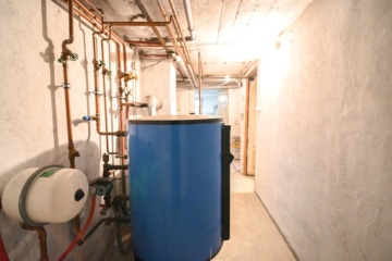 Gut geschnittenes 2-Familienhaus mit Garage, Carport, Garten und Keller! - Heizraum KG (638357)