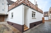 DIETZ: Provisionsfreie, renovierungsbedürftige Doppelhaushälfte mit 55qm Halle in Schaafheim - Hauseingang