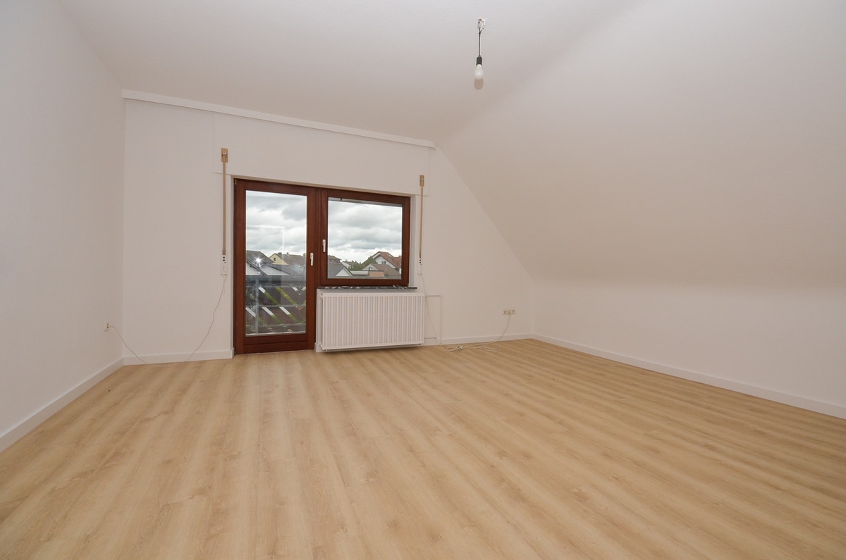 Wohnzimmer mit Balkon