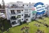 DIETZ: Neuwertige 4-Zimmer-Wohnung mit Balkon, Kaminofen, TG-Stellplatz - Am Fechenheimer Wald! - Außenansicht