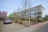 DIETZ: Neuwertige 4-Zimmer-Wohnung mit Balkon, Kaminofen, TG-Stellplatz - Am Fechenheimer Wald! - Außenansicht