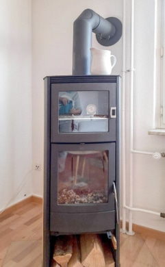 DIETZ: 1-2 Familienhaus in Urberach – modernisiert! - Kaminofen des Mieters EG (672241)