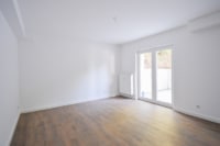 Wohn- und Esszimmer mit Küchenbereich