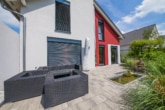 Terrasse - Neuwertiges Einfamilienhaus mit TOP-Ausstattung! Garage, gepflegter Garten in Hergershausen!