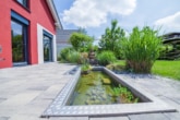 Terrasse - Neuwertiges Einfamilienhaus mit TOP-Ausstattung! Garage, gepflegter Garten in Hergershausen!