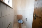 Gepflegte Doppelhaushälfte mit Terrasse und Garage in beliebter Wohngegend von Münster! - Gäste WC EG