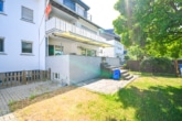 Außenansicht - DIETZ: Gepflegte 4-Zi. Erdgeschosswohnung mit Terrasse, Garten, Garage und viel Lagerfläche!
