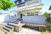 Außenansicht - DIETZ: Gepflegte 4-Zi. Erdgeschosswohnung mit Terrasse, Garten, Garage und viel Lagerfläche!