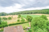 Herrliche Lage - DIETZ: Gepflegter Bungalow mit Garten, Garage und Keller in herrlicher Lage von Wiebelsbach!