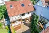 DIETZ: Gepflegtes Einfamilienhaus mit 2 Balkonen, 2 Garagen, Terrasse und Garten in Münster! - Außenansicht