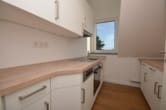 DIETZ: Sanierte 3-Zimmer-Wohnung mit Einbauküche, Garage mit E-Anschluss - Wärmepumpe! - Einbauküche zzgl 40 Euro - mtl