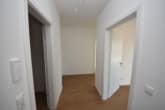 HAUS PAULA! Neubauwohnung mit 27m² Dachterrasse ! Wärmepumpe - Aufzug - Tiefgarage - Diele Schlafbereiche