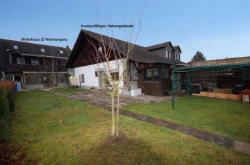 **VERKAUFT**  Ein Haus für 2 Generationen mit Ausbaureserven. mit 2 großen Garagen und 812 m² großem Grundstück !!!, 63762 Großostheim, Zweifamilienhaus