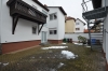 **VERKAUFT**DIETZ: 2-Familienhaus mit zusätzlicher Einliegerwohnung im DG + Nebengebäude in Großostheim - Innenhof